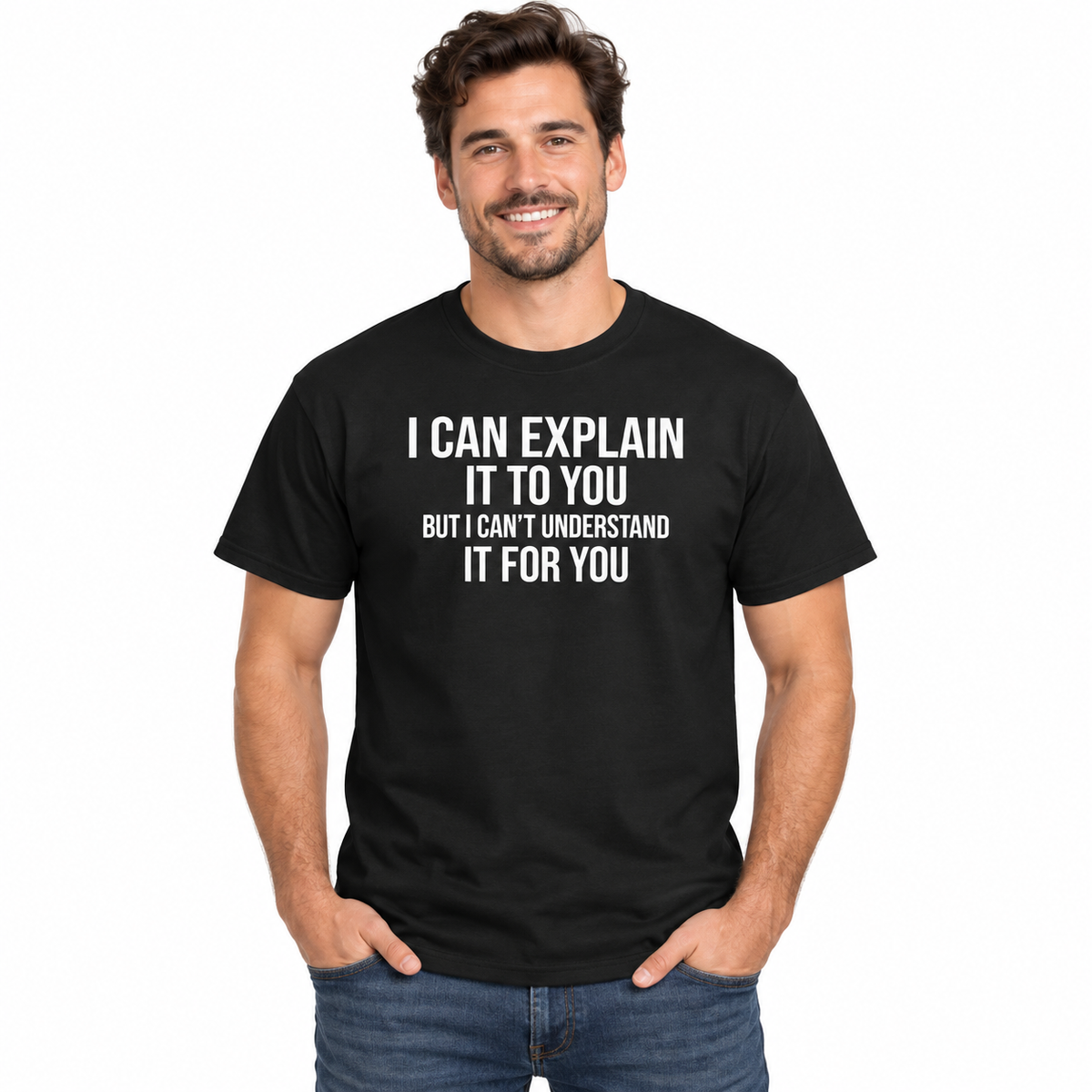A man wearing a black short-sleeve t-shirt with white printed text that reads 'I CAN EXPLAIN IT TO YOU BUT I CAN'T UNDERSTAND IT FOR YOU', paired with blue jeans, against a plain white background.