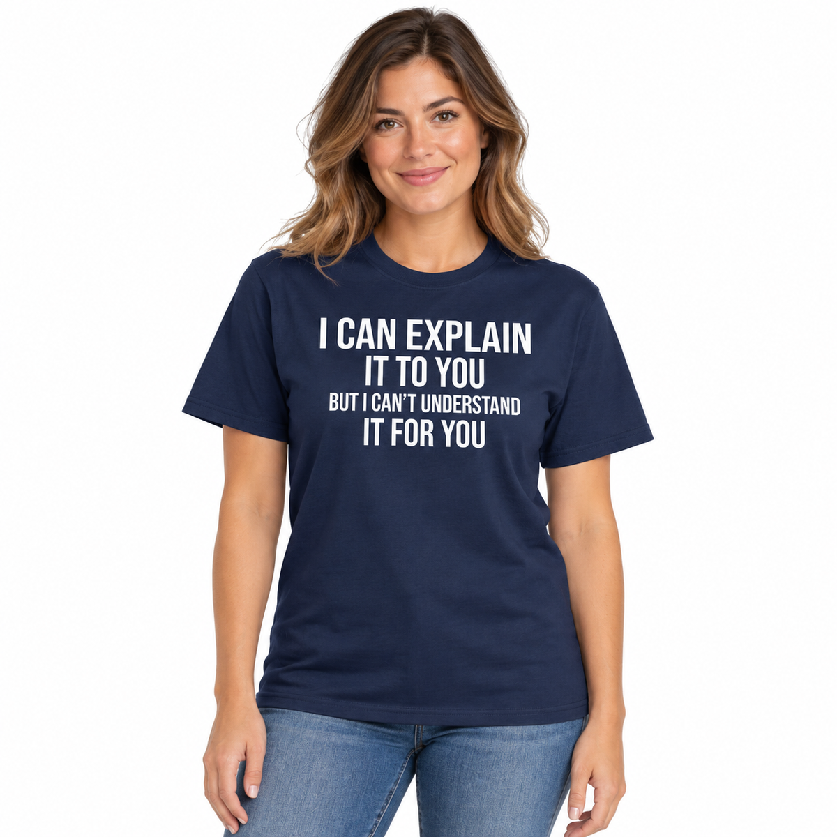 A woman wearing a navy blue graphic t-shirt with the white printed text 'I CAN EXPLAIN IT TO YOU BUT I CAN'T UNDERSTAND IT FOR YOU', paired with blue jeans, against a plain white background.