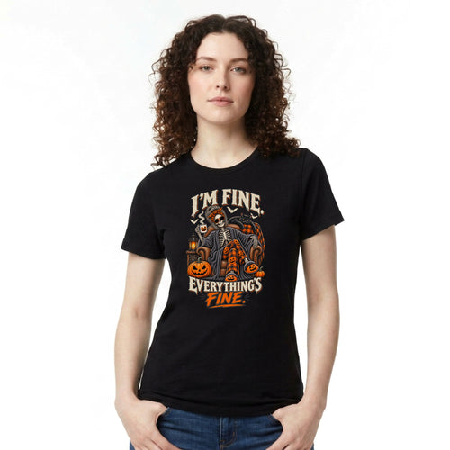 A woman with curly brown hair wearing a black graphic t-shirt with a Halloween-themed design that reads 'I'M FINE. EVERYTHING'S FINE.