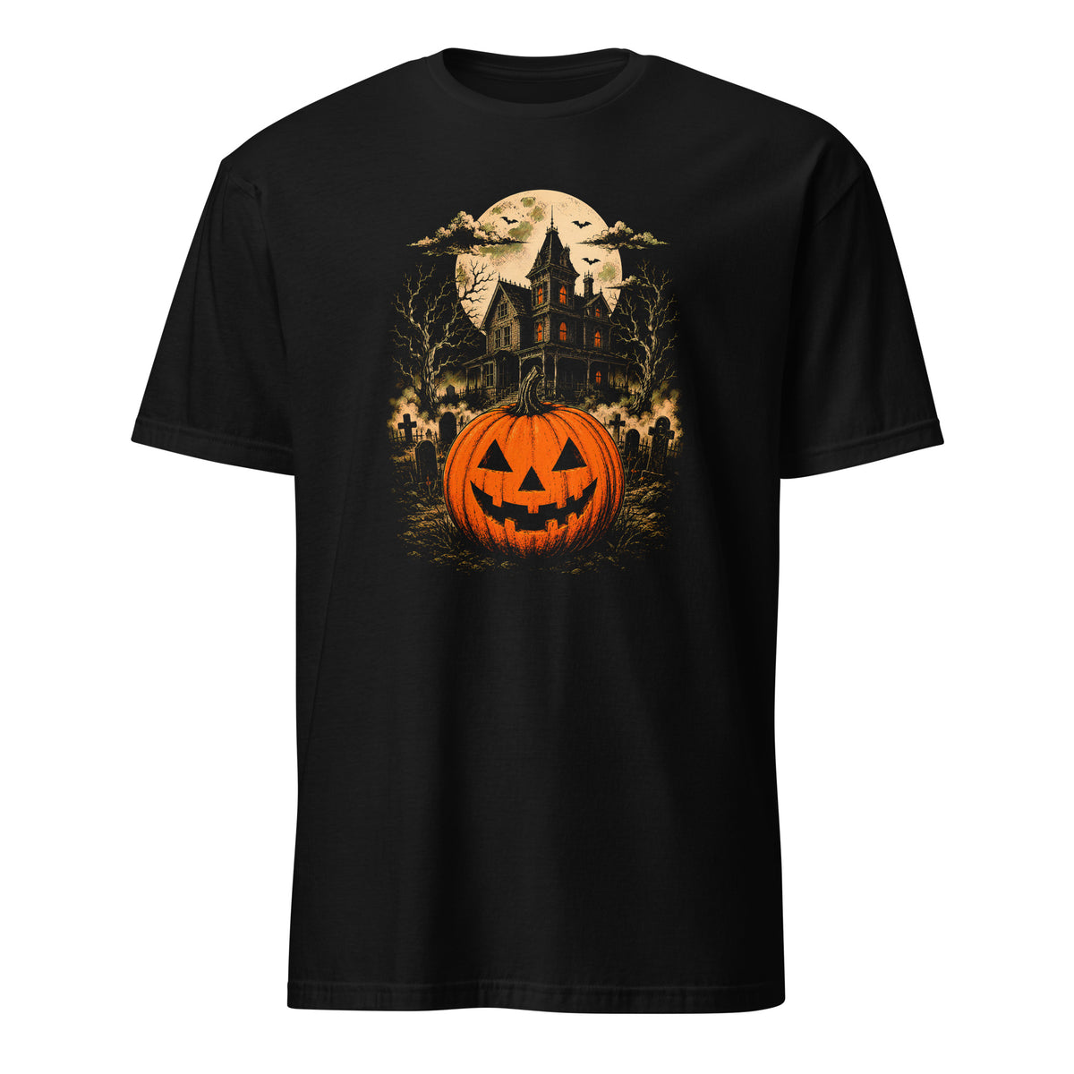 A black short-sleeve crewneck t-shirt featuring a detailed Halloween graphic print on the front. The graphic depicts a glowing orange jack-o'-lantern pumpkin in the foreground, set against a spooky haunted house, bare trees, a full moon, and flying bats.
