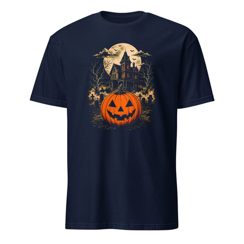 A navy blue short-sleeve crewneck t-shirt featuring a detailed Halloween graphic print on the front. The graphic depicts a glowing orange jack-o'-lantern pumpkin in the foreground, set against a spooky haunted house, bare trees, a full moon, and bats.