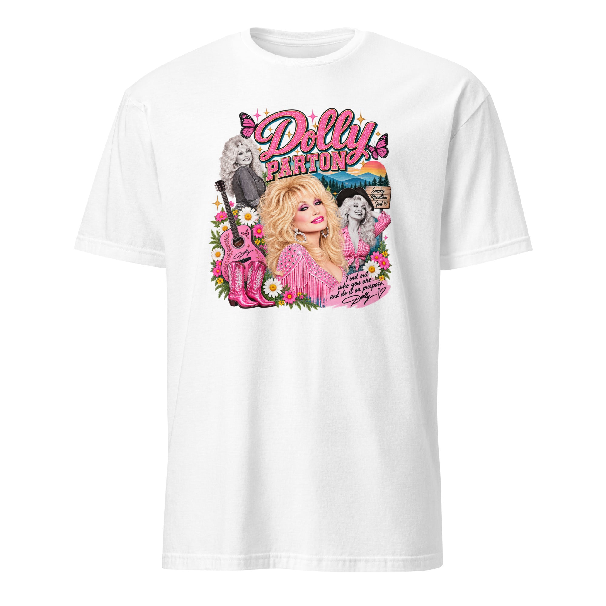 A white short-sleeve crewneck t-shirt featuring a colorful graphic print of Dolly Parton on the front, set against a plain white background.
