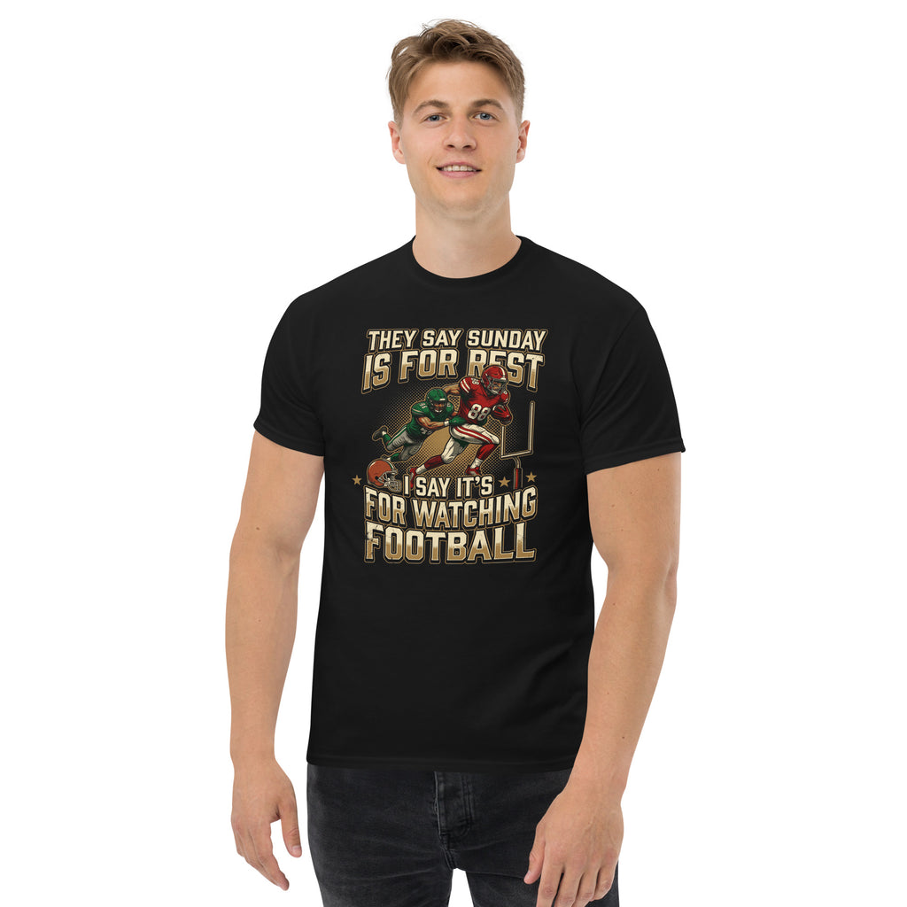 Person wearing a black t-shirt with football players.