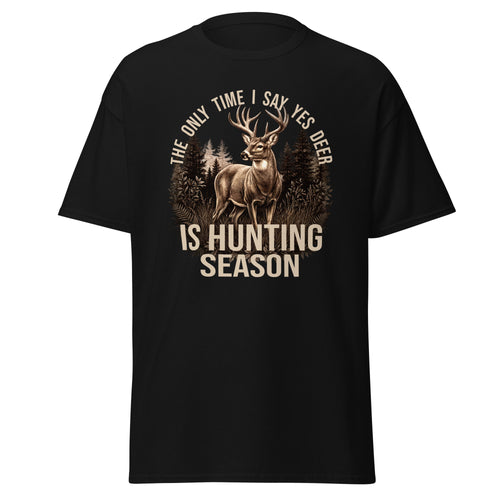 A black short-sleeve t-shirt with a graphic print of a deer in a forest and the text 'THE ONLY TIME I SAY YES DEER IS HUNTING SEASON' in beige, shown on a plain white background.