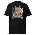A black short-sleeve crewneck t-shirt featuring a large graphic print of three cats (one black, one tabby, one calico) above a vintage-style banner that reads 'DON'T MESS WITH A CAT PERSON' and 'MY DRY HAS CLIMBED AND TOO REGRETS'.