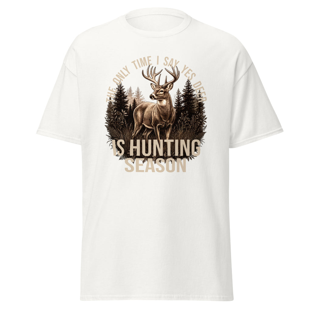 A white short-sleeve crewneck t-shirt featuring a front graphic of a deer standing in a pine forest, with the text 'THE ONLY TIME I SAY YES WHEN I SEE IT IS HUNTING SEASON' in a circular design.