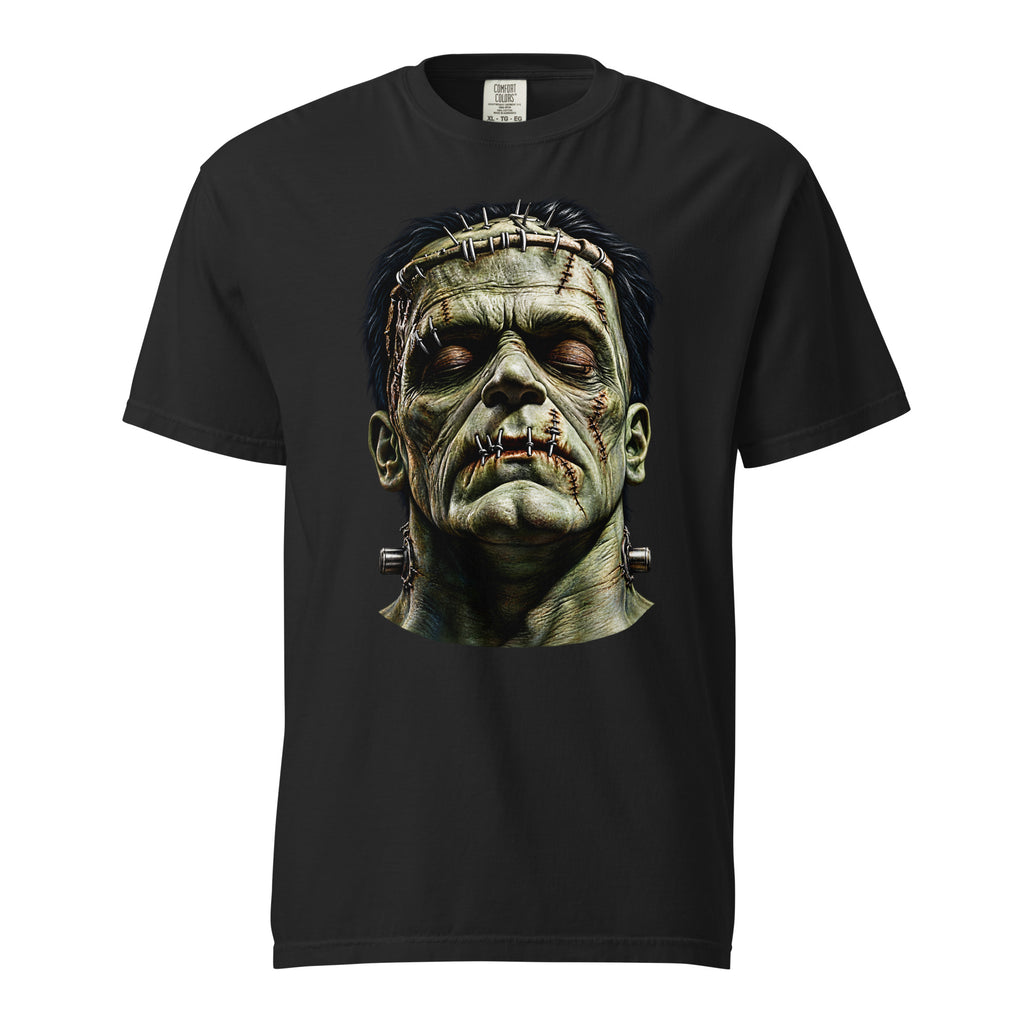 A black short-sleeve crewneck t-shirt featuring a large graphic print of Frankenstein's monster face on the chest, shown against a plain white background.