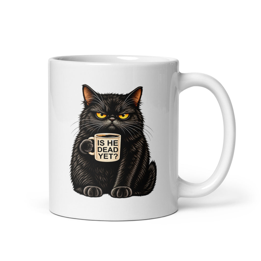 A white ceramic coffee mug featuring a graphic illustration of a grumpy black cat with yellow eyes holding a smaller mug that reads 'IS HE DEAD YET?'.